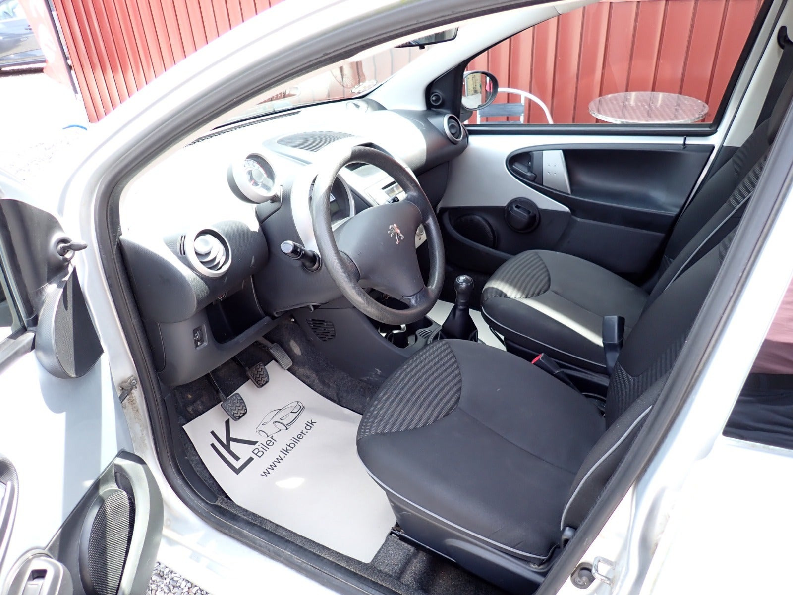 Sølv Peugeot 107 fra 2007