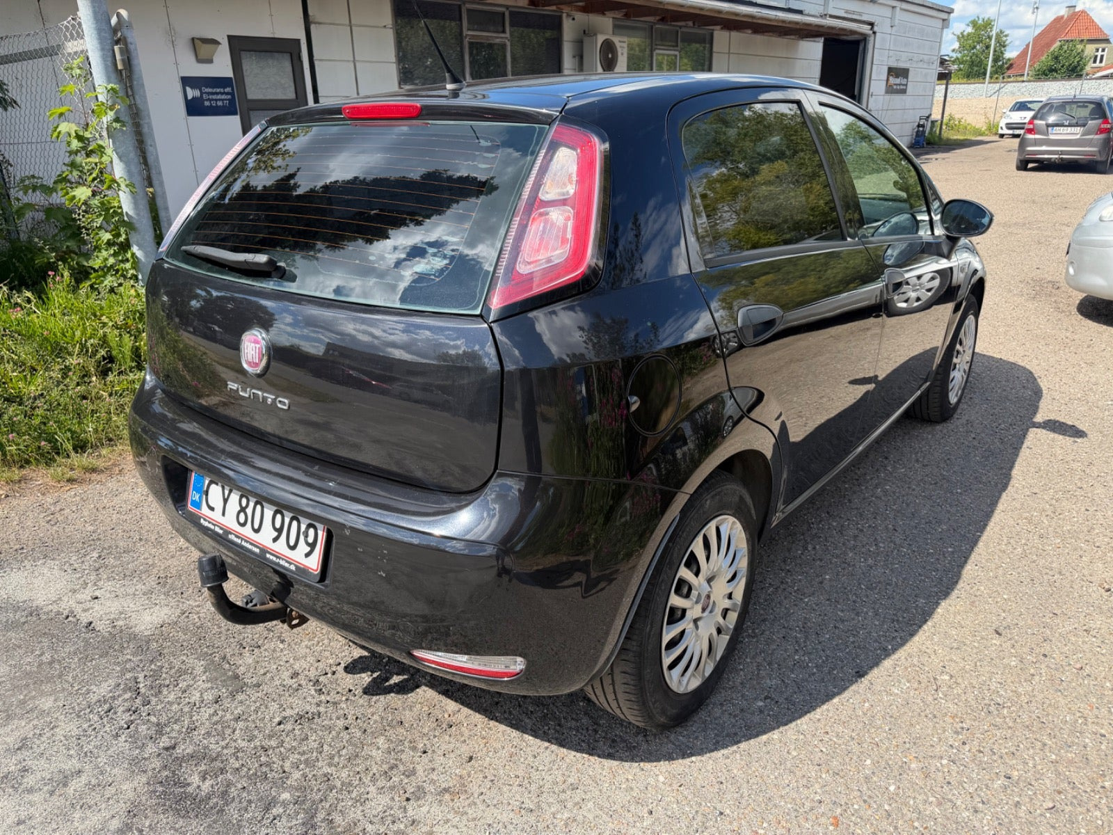 Grøn Fiat Punto fra 2012