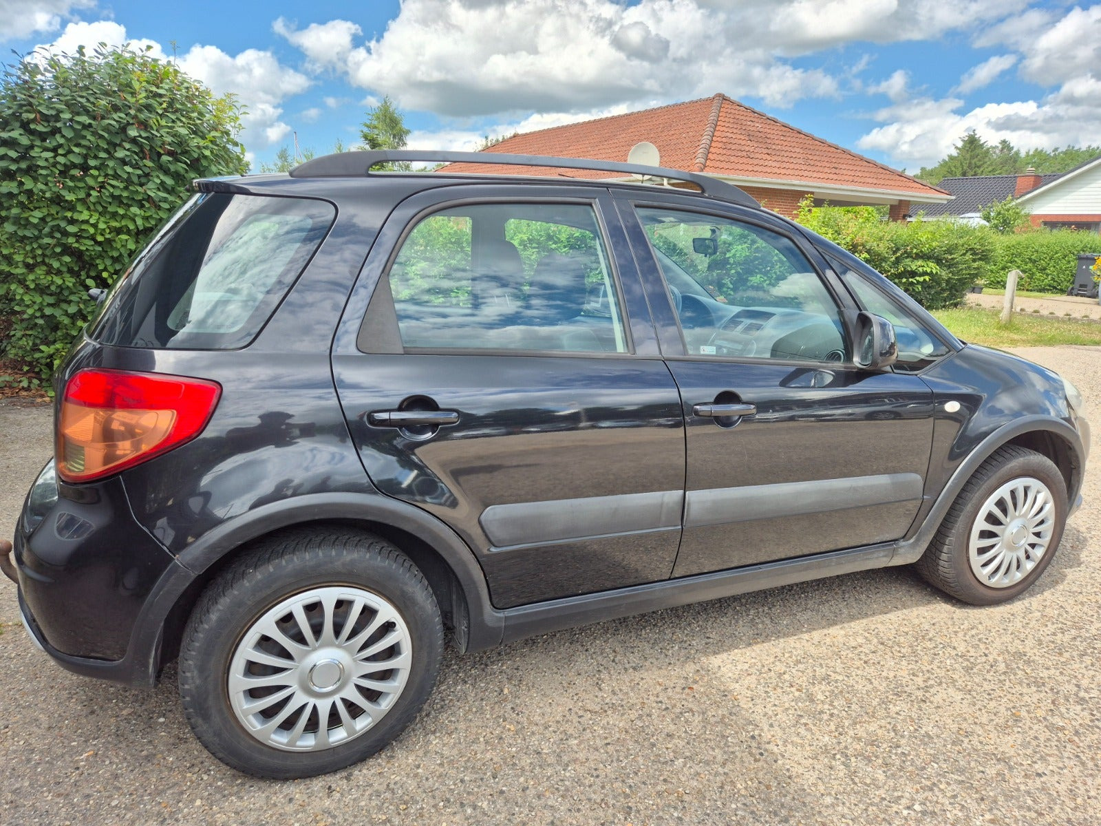 Grøn Suzuki SX4 fra 2006