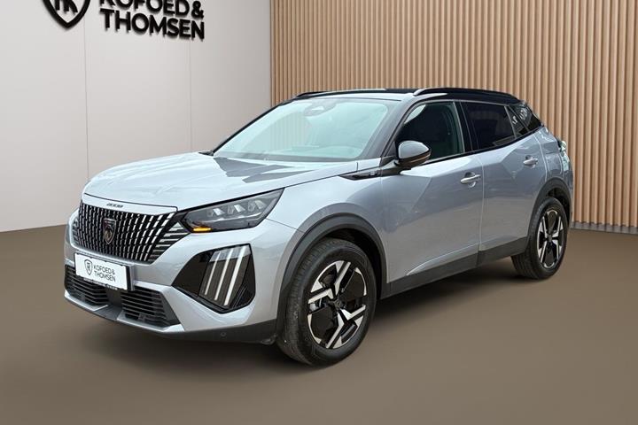 Grå Peugeot e-2008 fra 2025 set udefra
