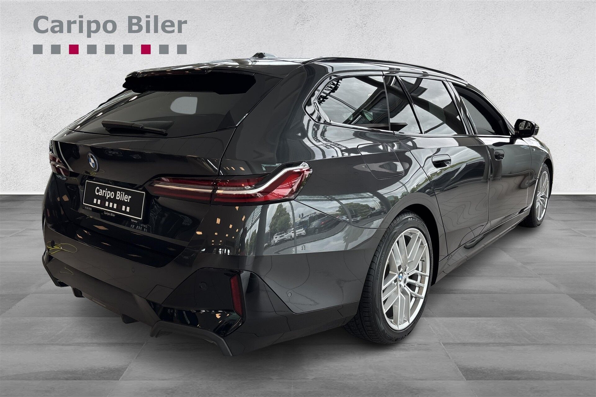 Grå BMW i5 fra 2025