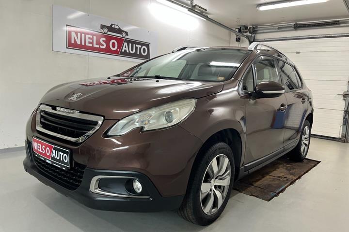 Brun Peugeot 2008 fra 2014 set udefra