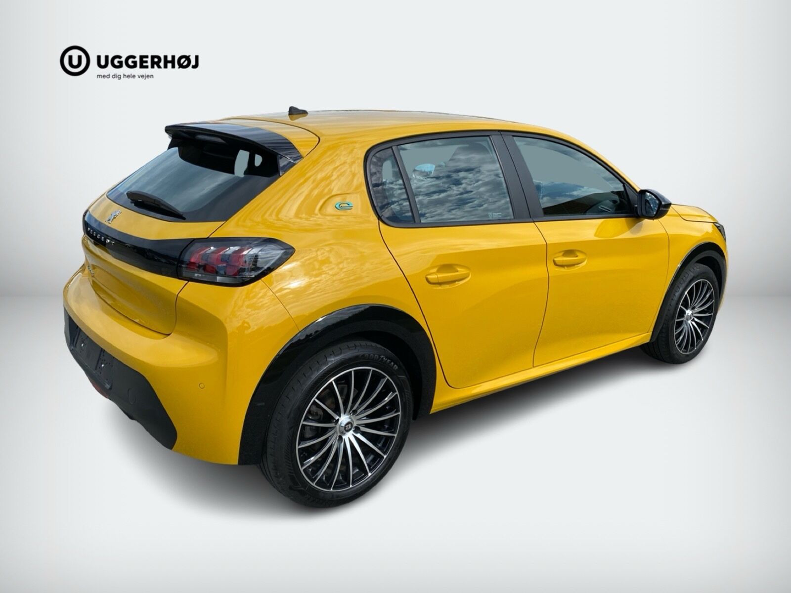 Gul Peugeot e-208 fra 2022
