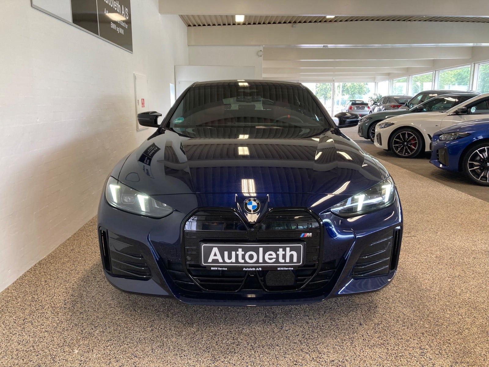 Blå BMW i4 fra 2026