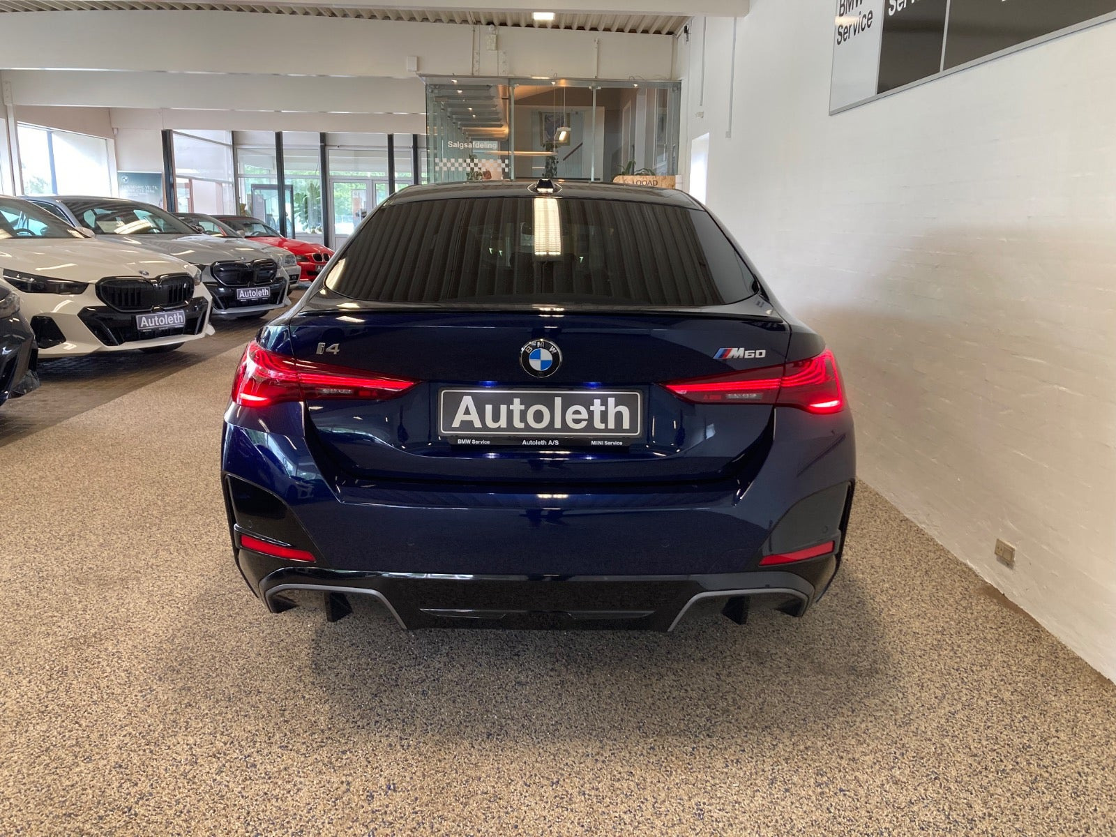 Blå BMW i4 fra 2026