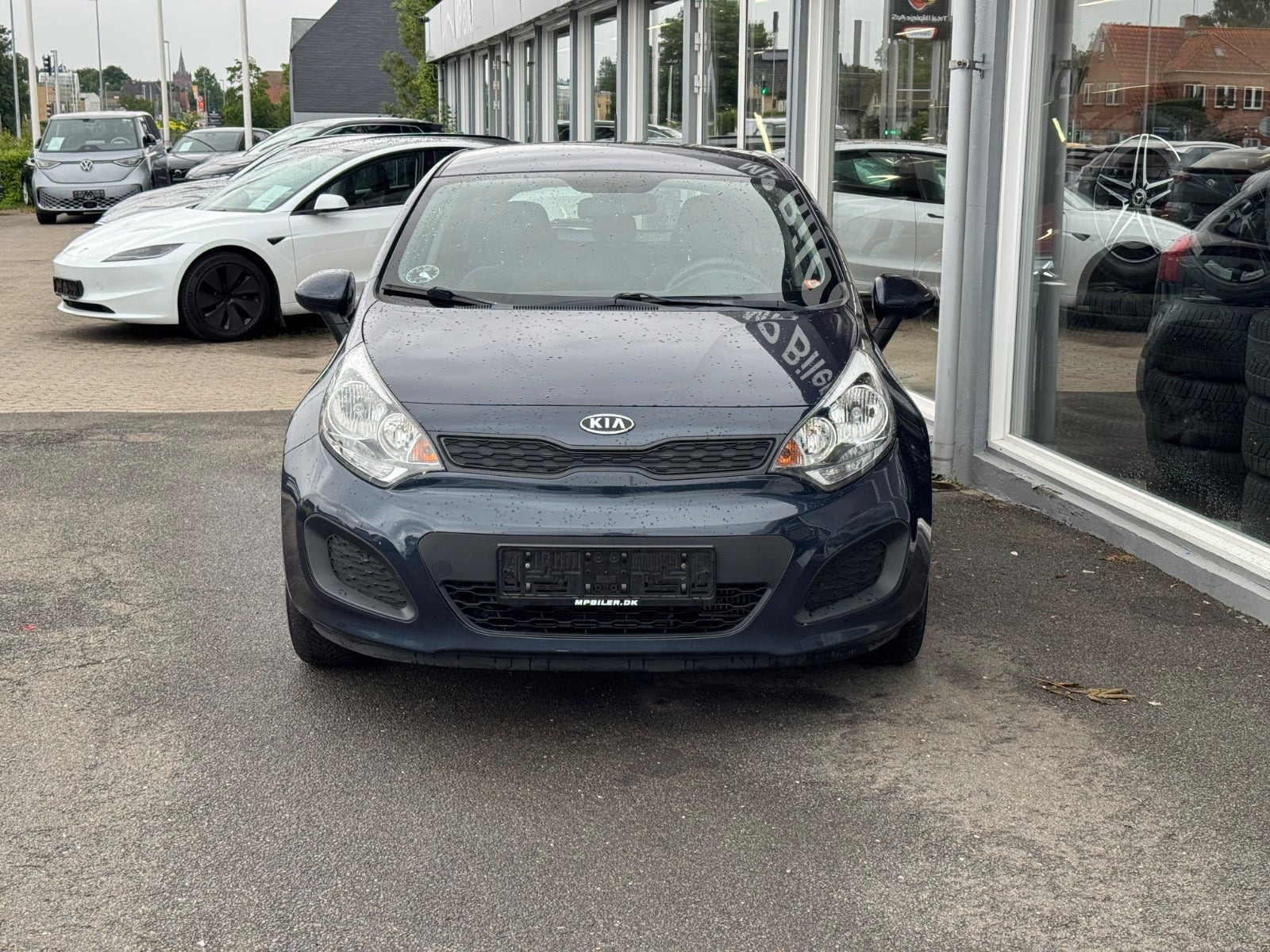 Blå Kia Rio fra 2014