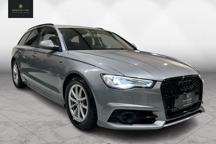 Grå Audi A6 fra 2015 set udefra
