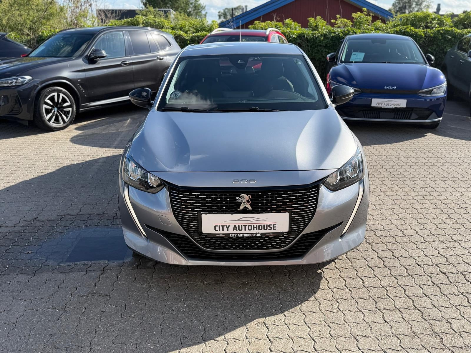 Sølv Peugeot e-208 fra 2022