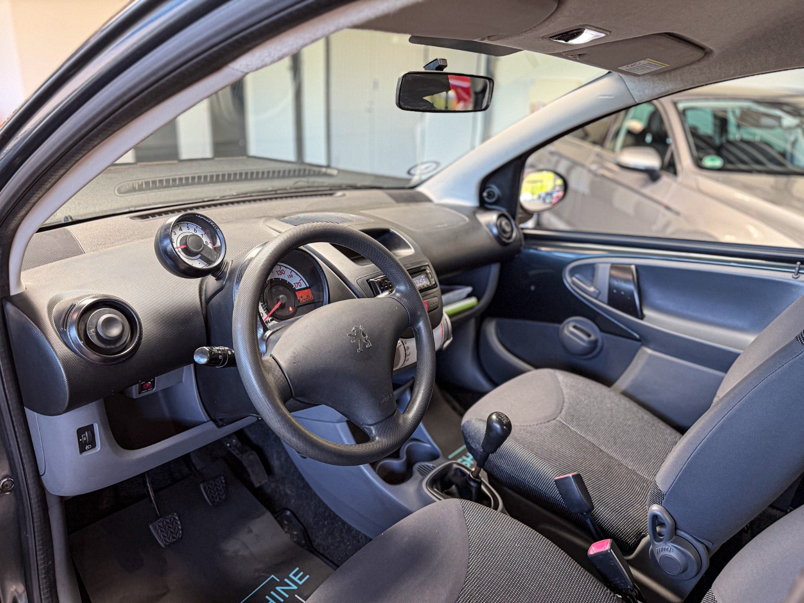 Grøn Peugeot 107 fra 2009