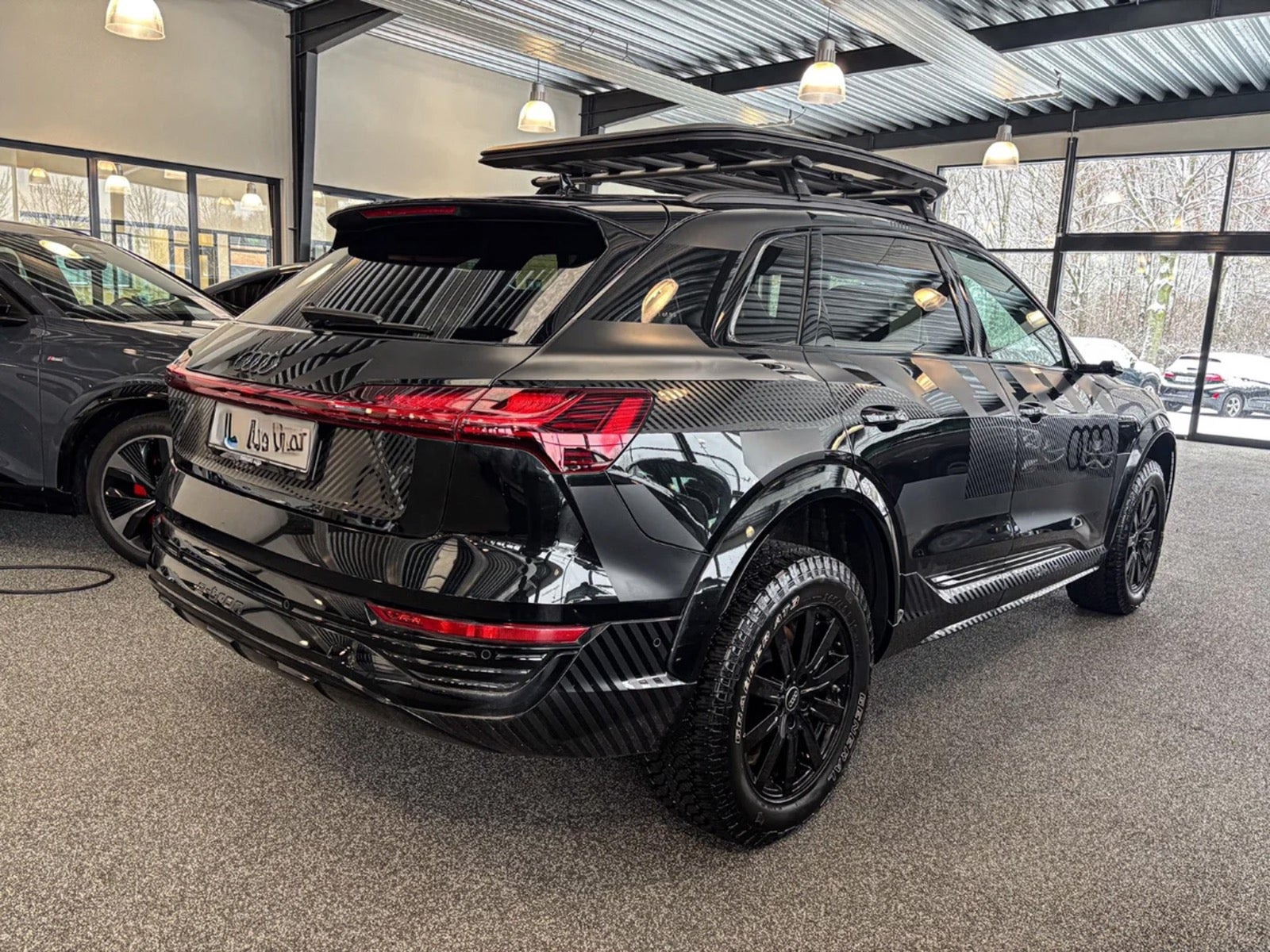 Rød Audi Q8 e-tron fra 2024