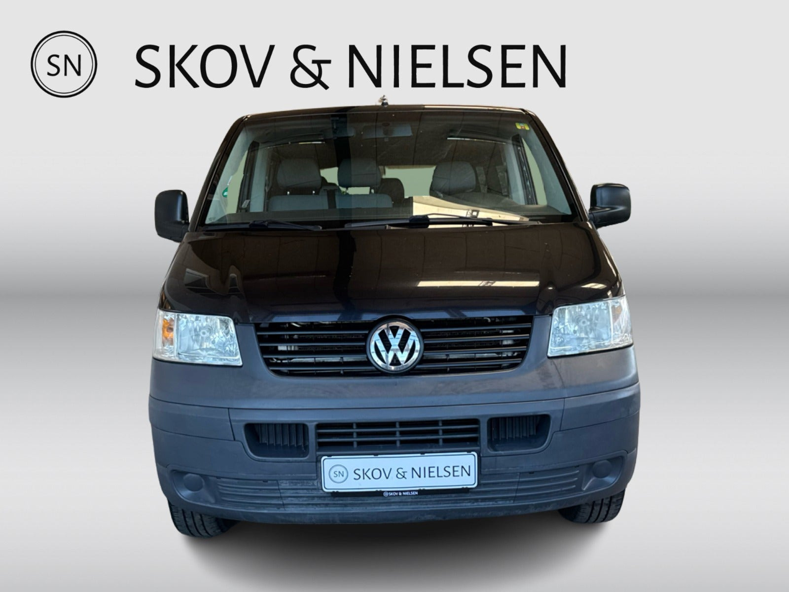 Blå VW Caravelle fra 2009