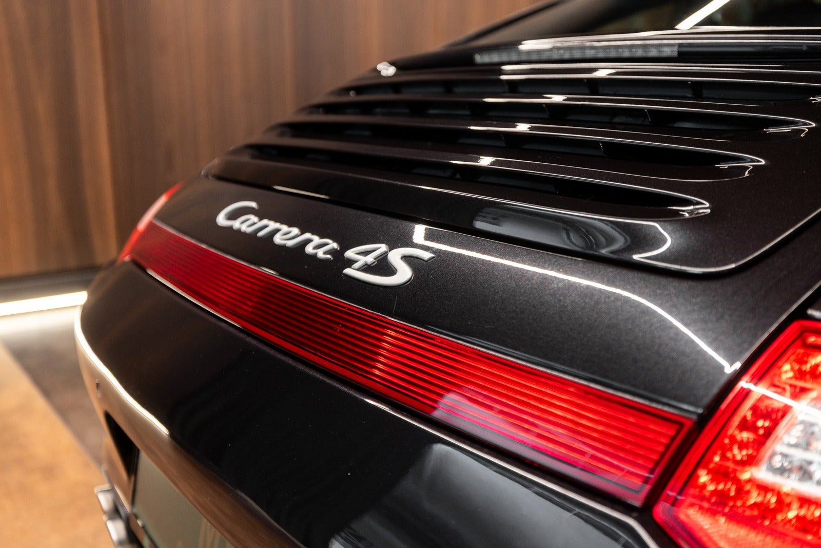 Sort Porsche 911 Carrera 4S fra 2009