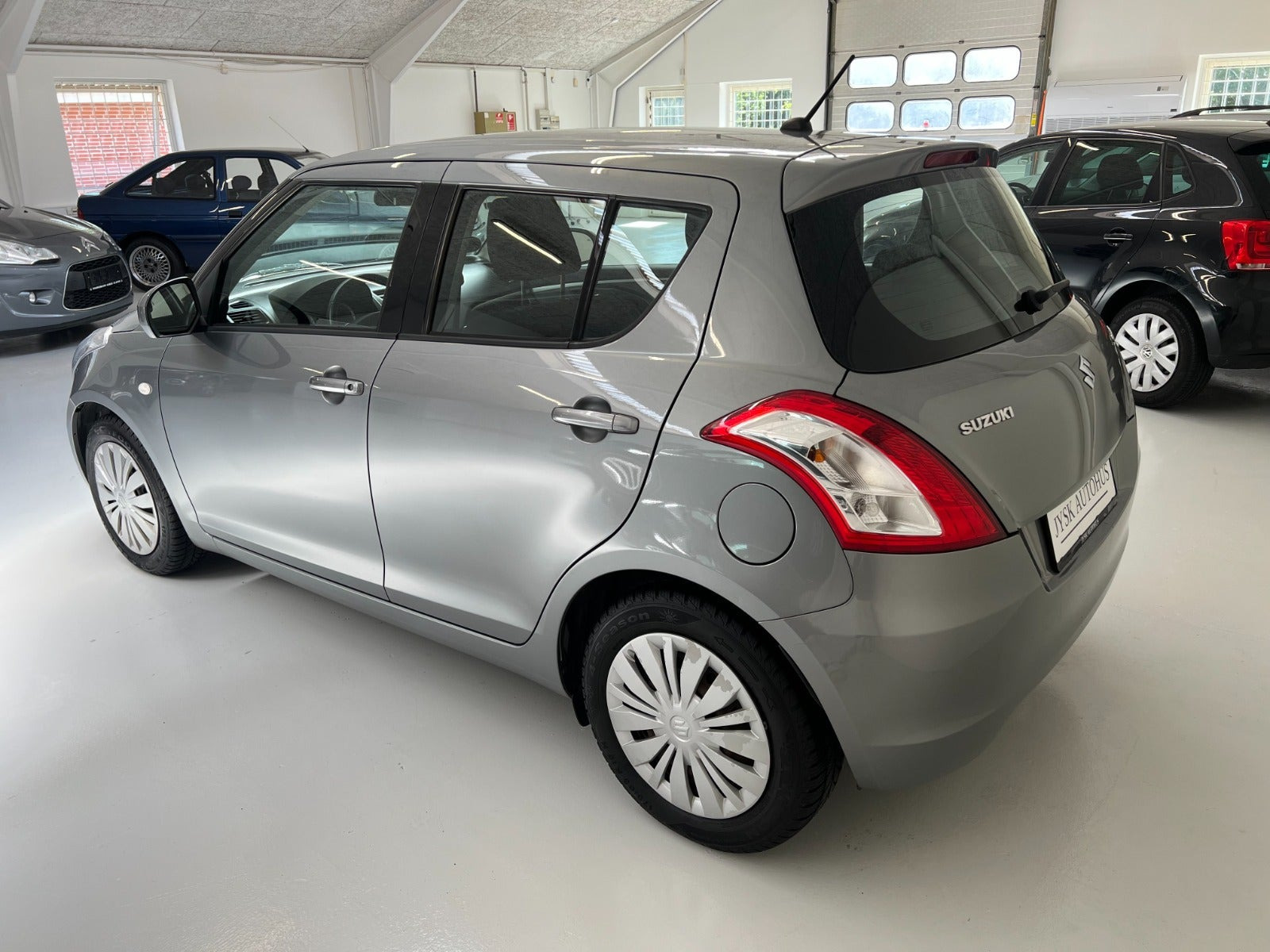 Grå Suzuki Swift fra 2015