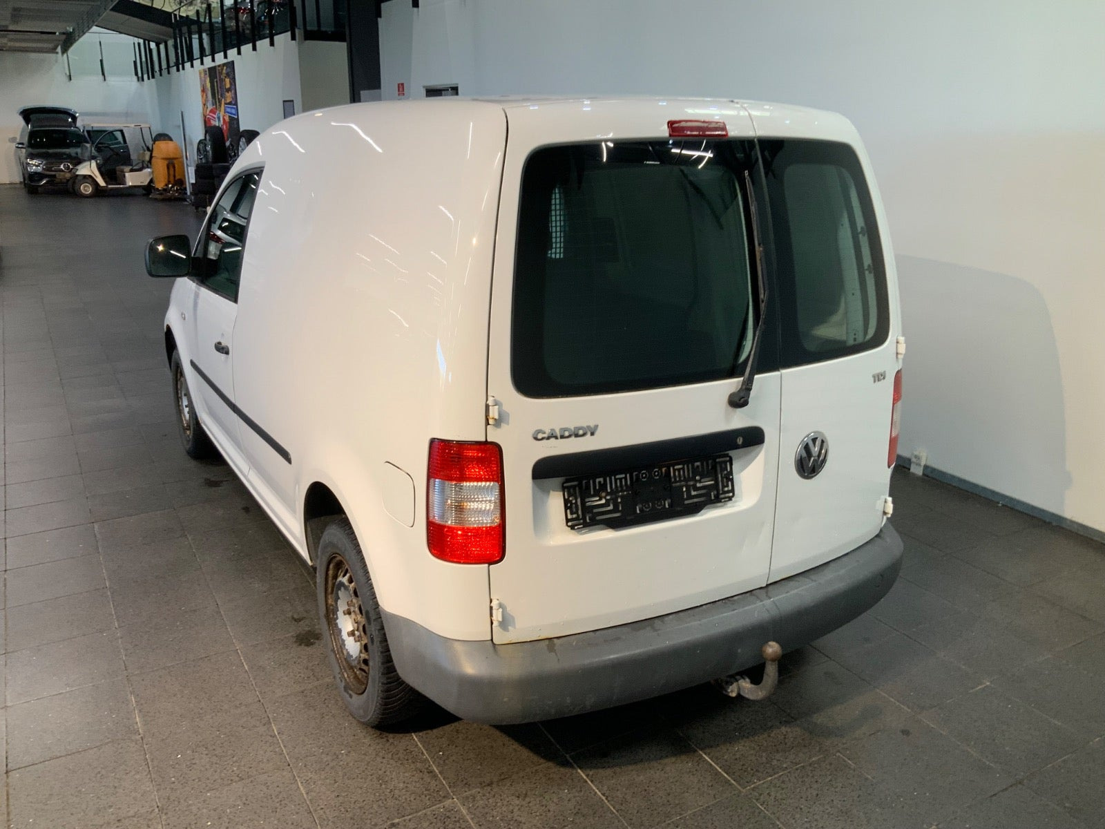 Hvid VW Caddy fra 2009