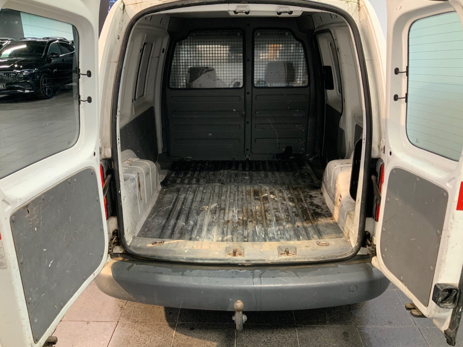 Hvid VW Caddy fra 2009