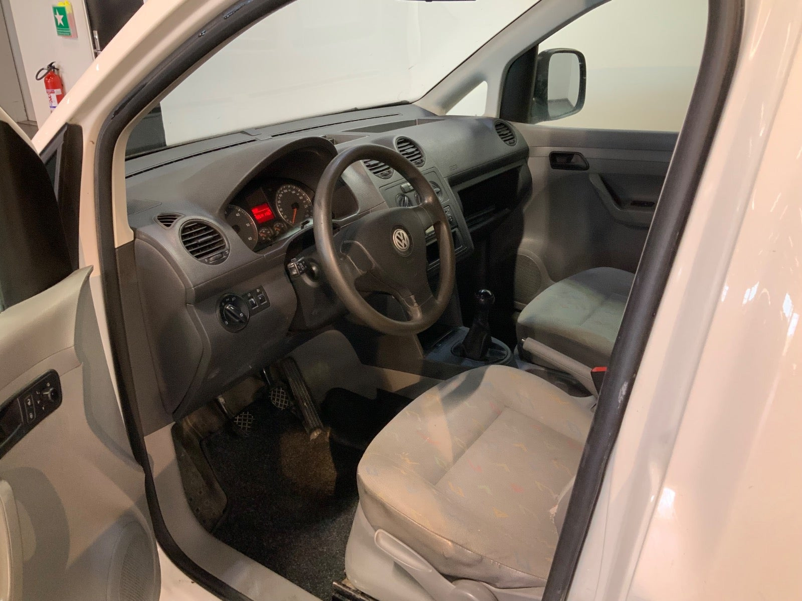 Hvid VW Caddy fra 2009