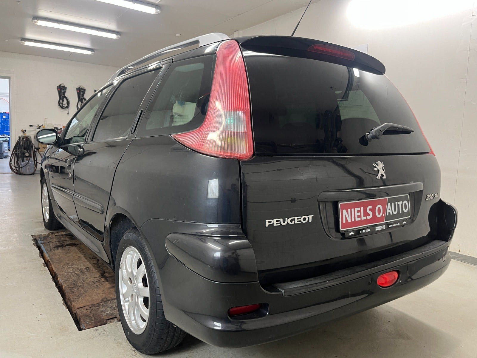 Sort Peugeot 206 fra 2006
