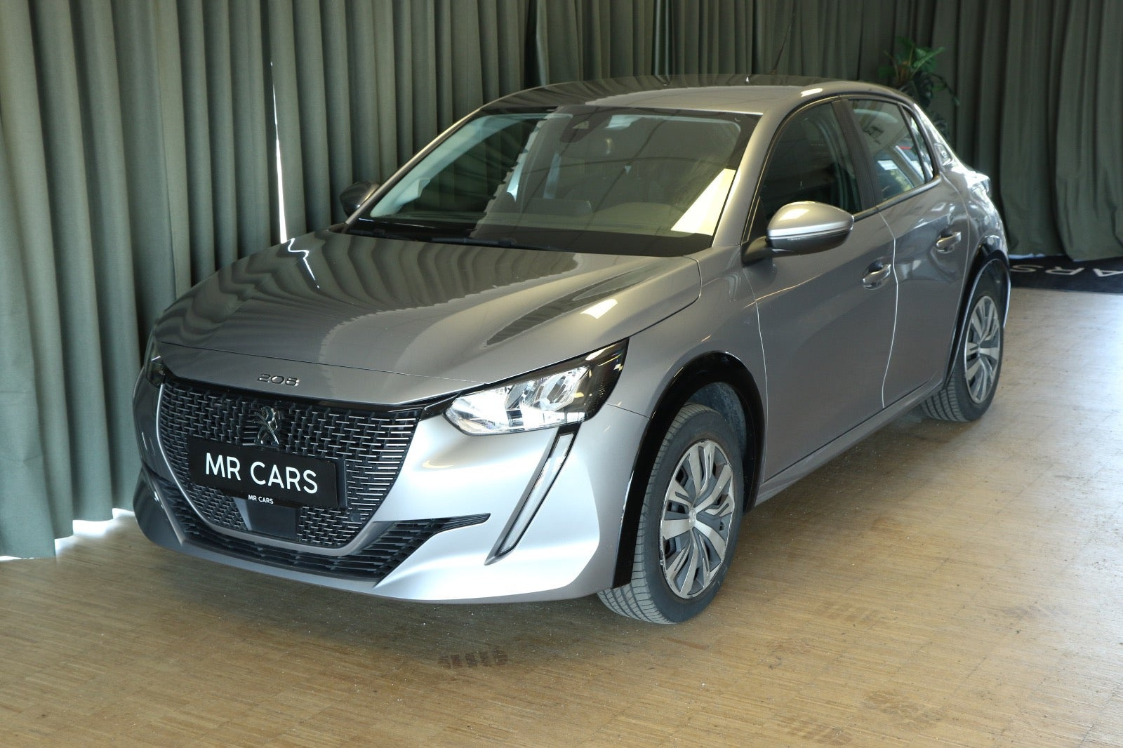 Grøn Peugeot e-208 fra 2021