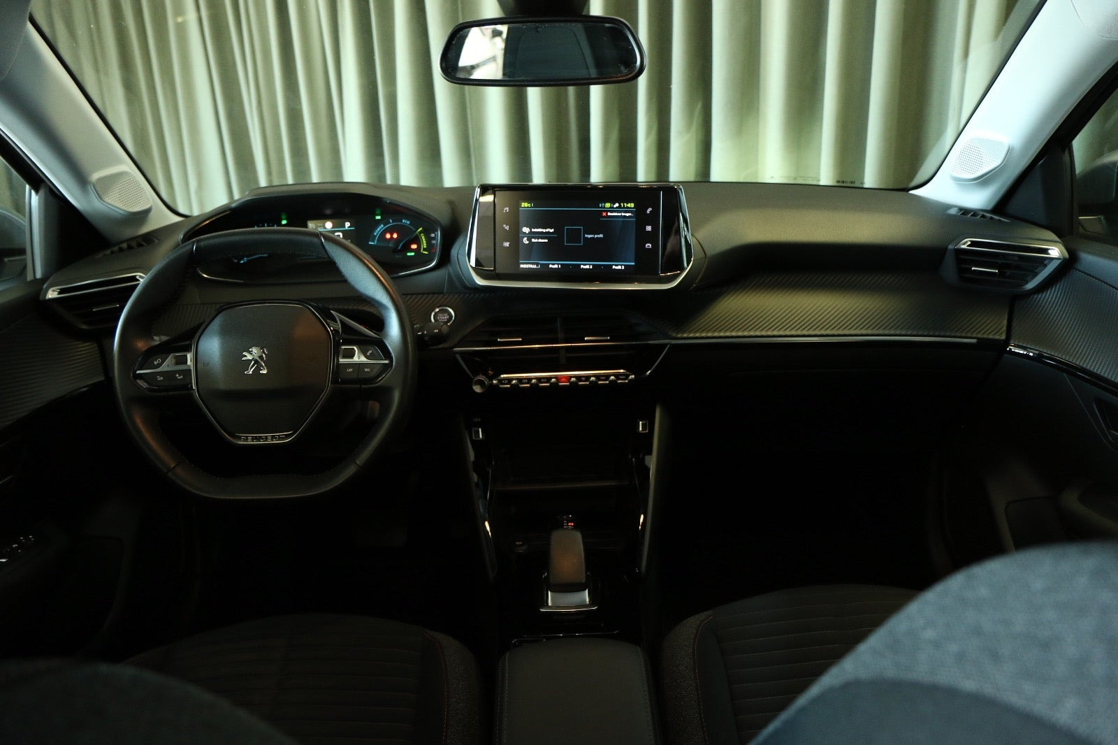 Grøn Peugeot e-208 fra 2021