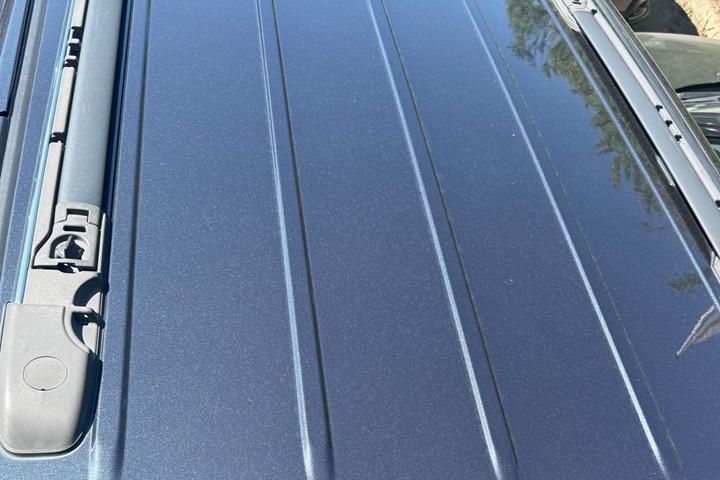 Gul Chrysler Grand Voyager fra 2014