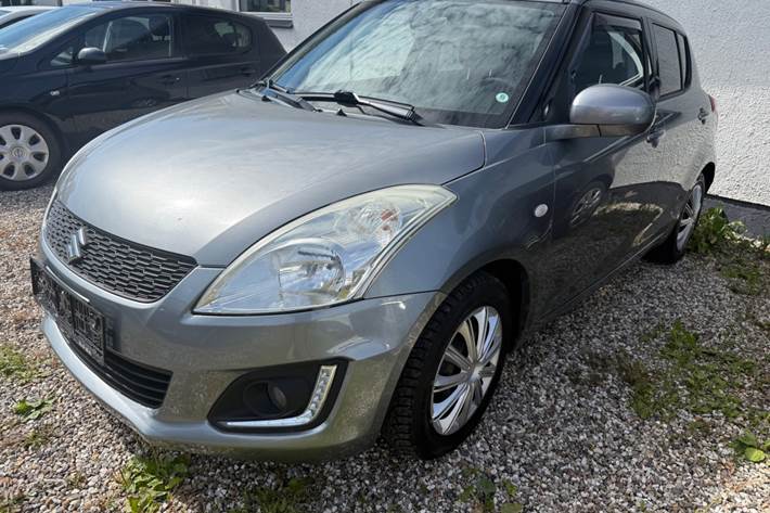 Grå Suzuki Swift fra 2015