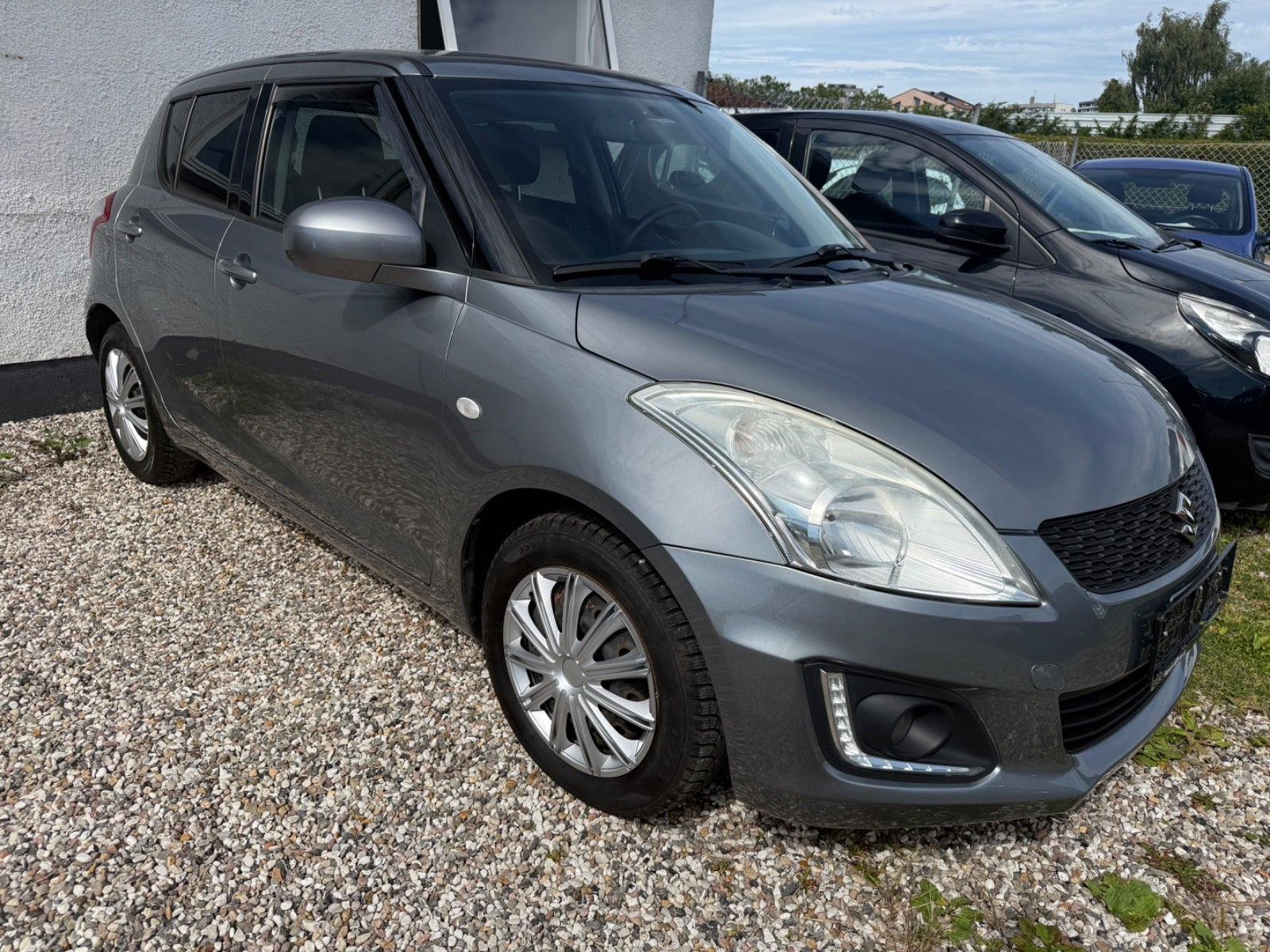 Grå Suzuki Swift fra 2015