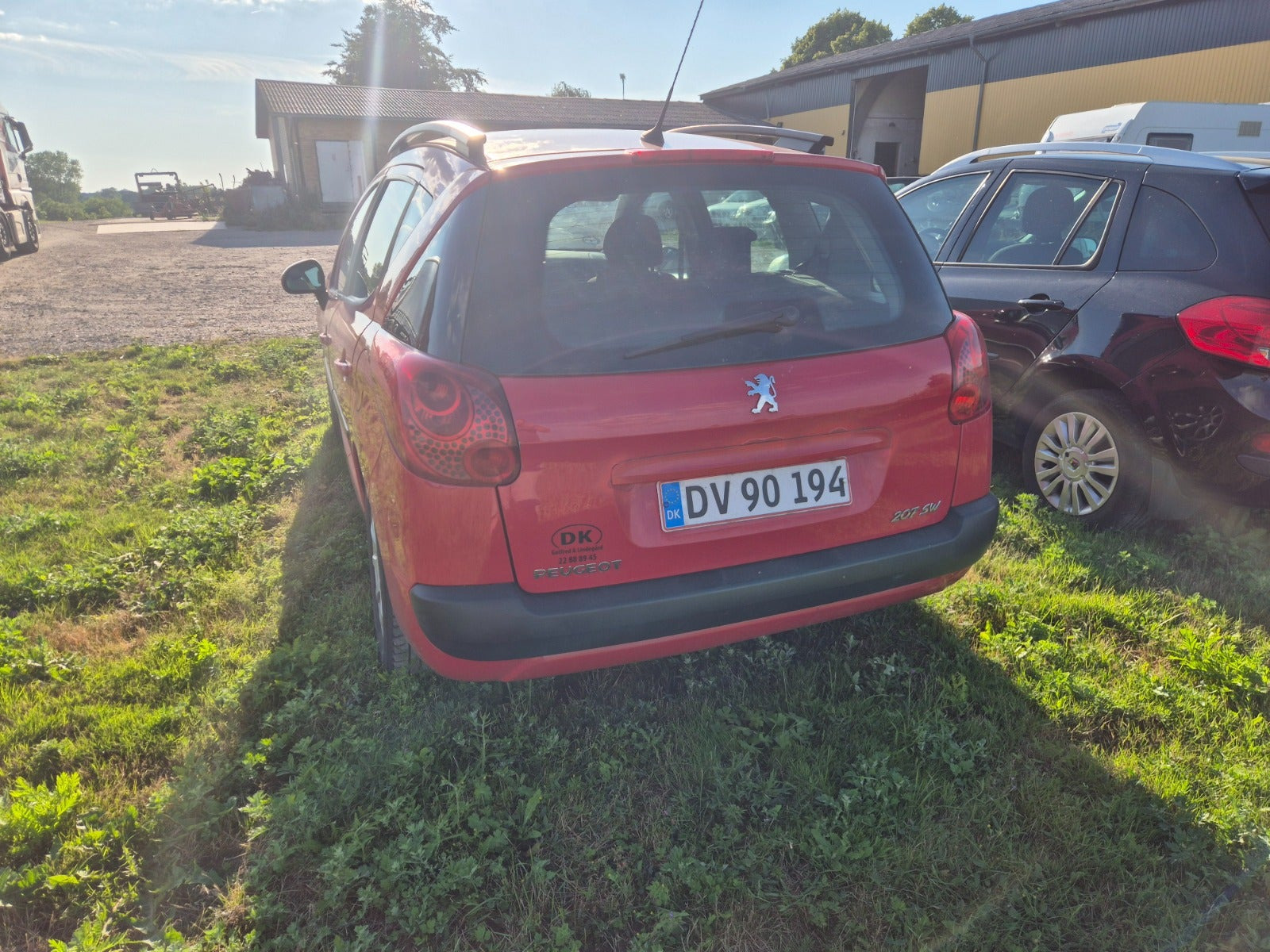 Rød Peugeot 207 fra 2008