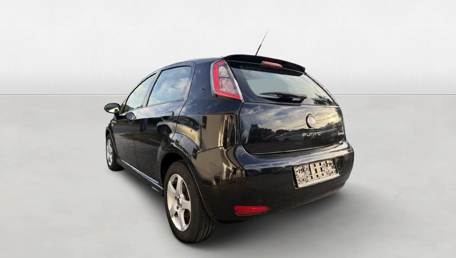 Grøn Fiat Punto fra 2014