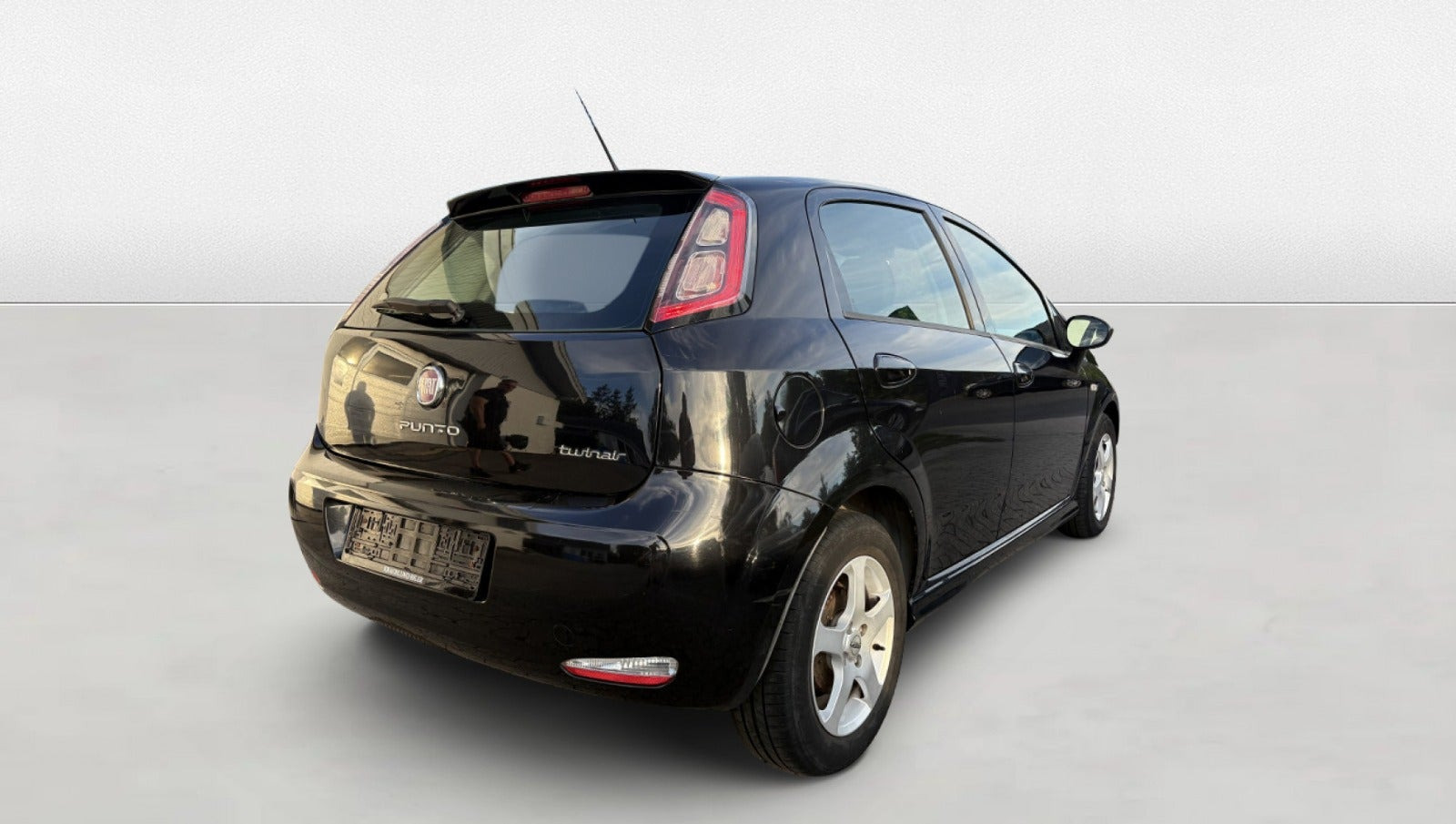 Grøn Fiat Punto fra 2014