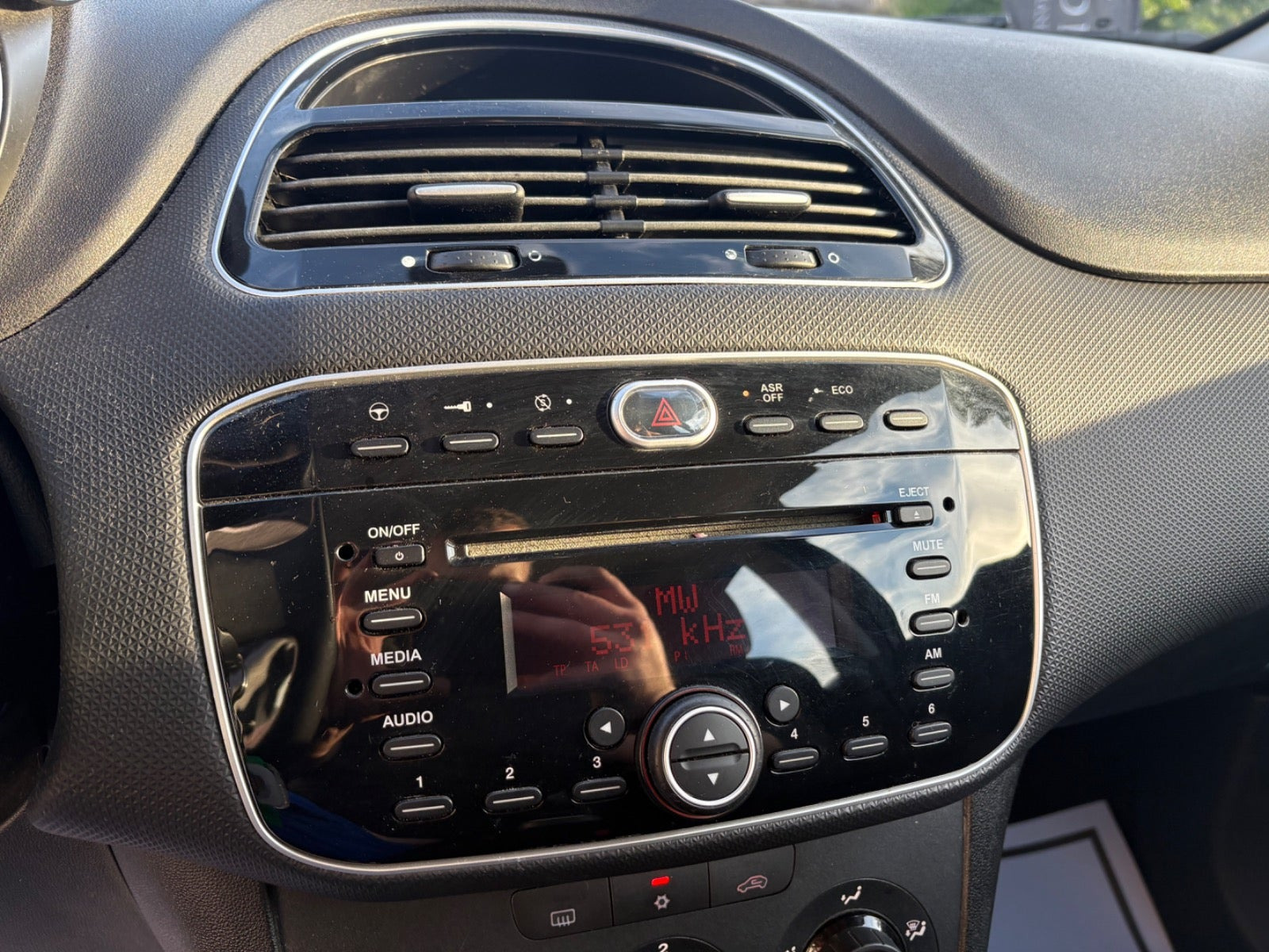 Grøn Fiat Punto fra 2014