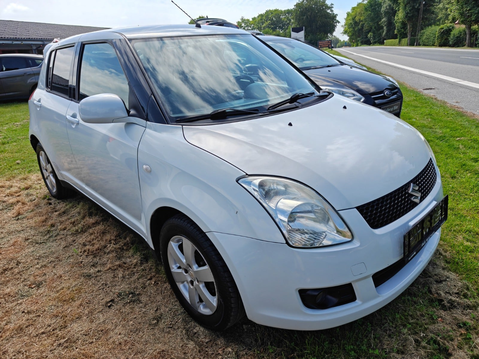 Gul Suzuki Swift fra 2009