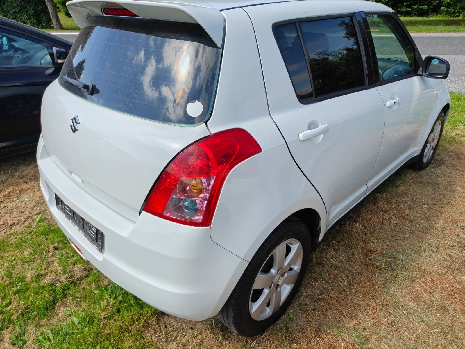 Gul Suzuki Swift fra 2009