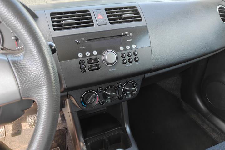 Gul Suzuki Swift fra 2009