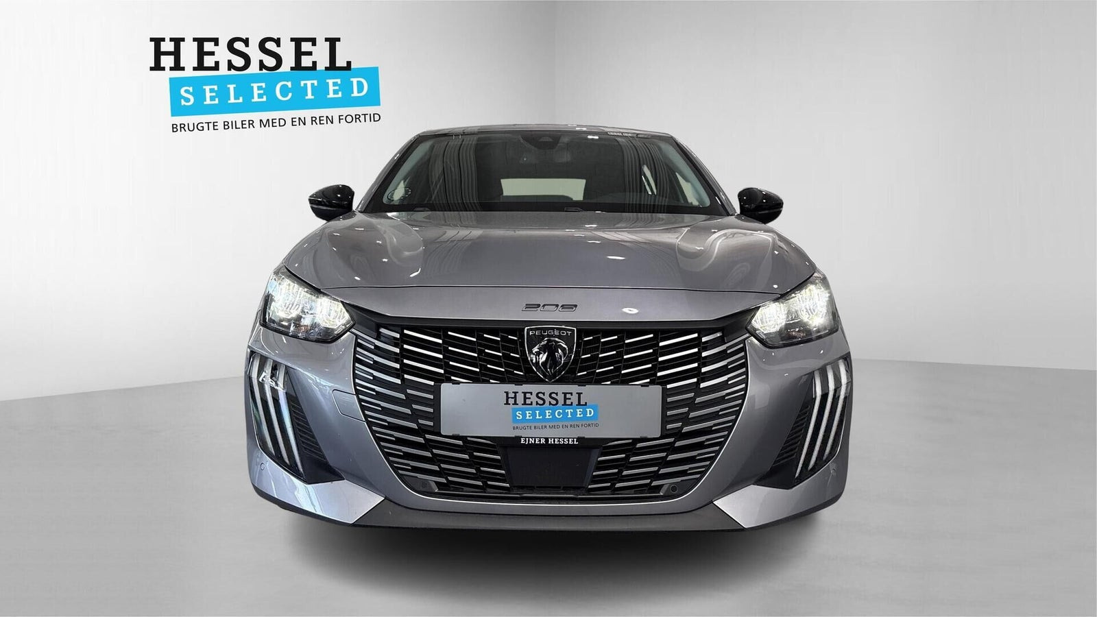 Grå Peugeot e-208 fra 2024