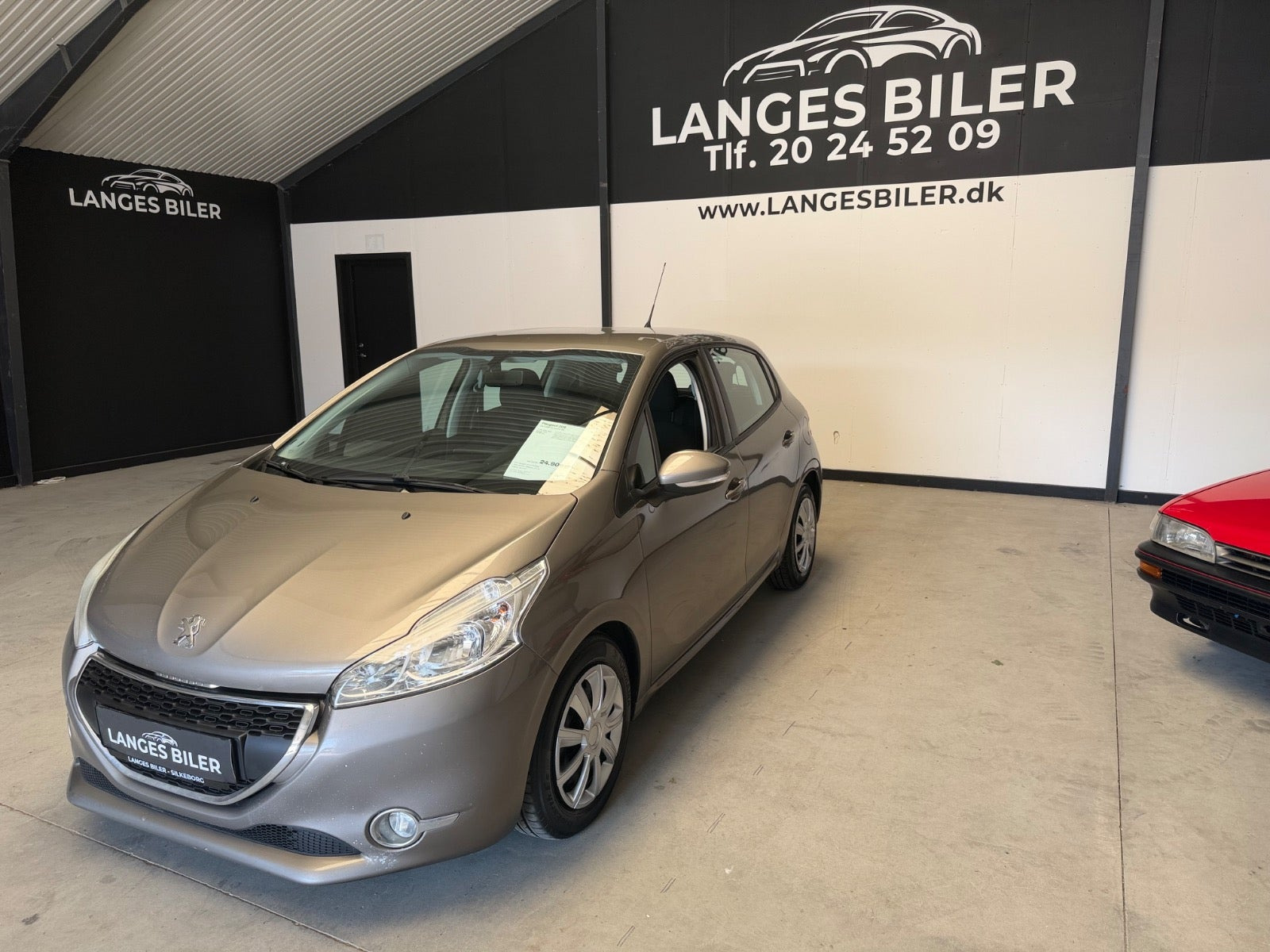 Beige Peugeot 208 fra 2012