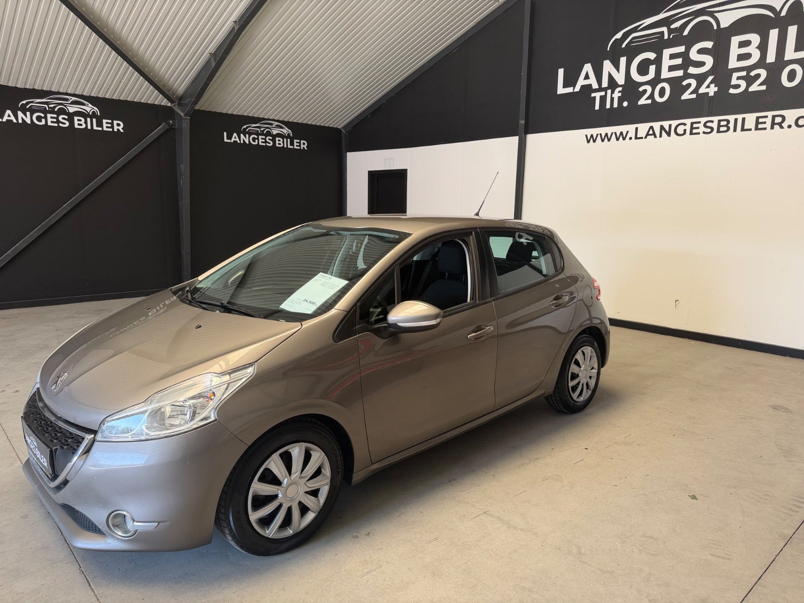 Beige Peugeot 208 fra 2012