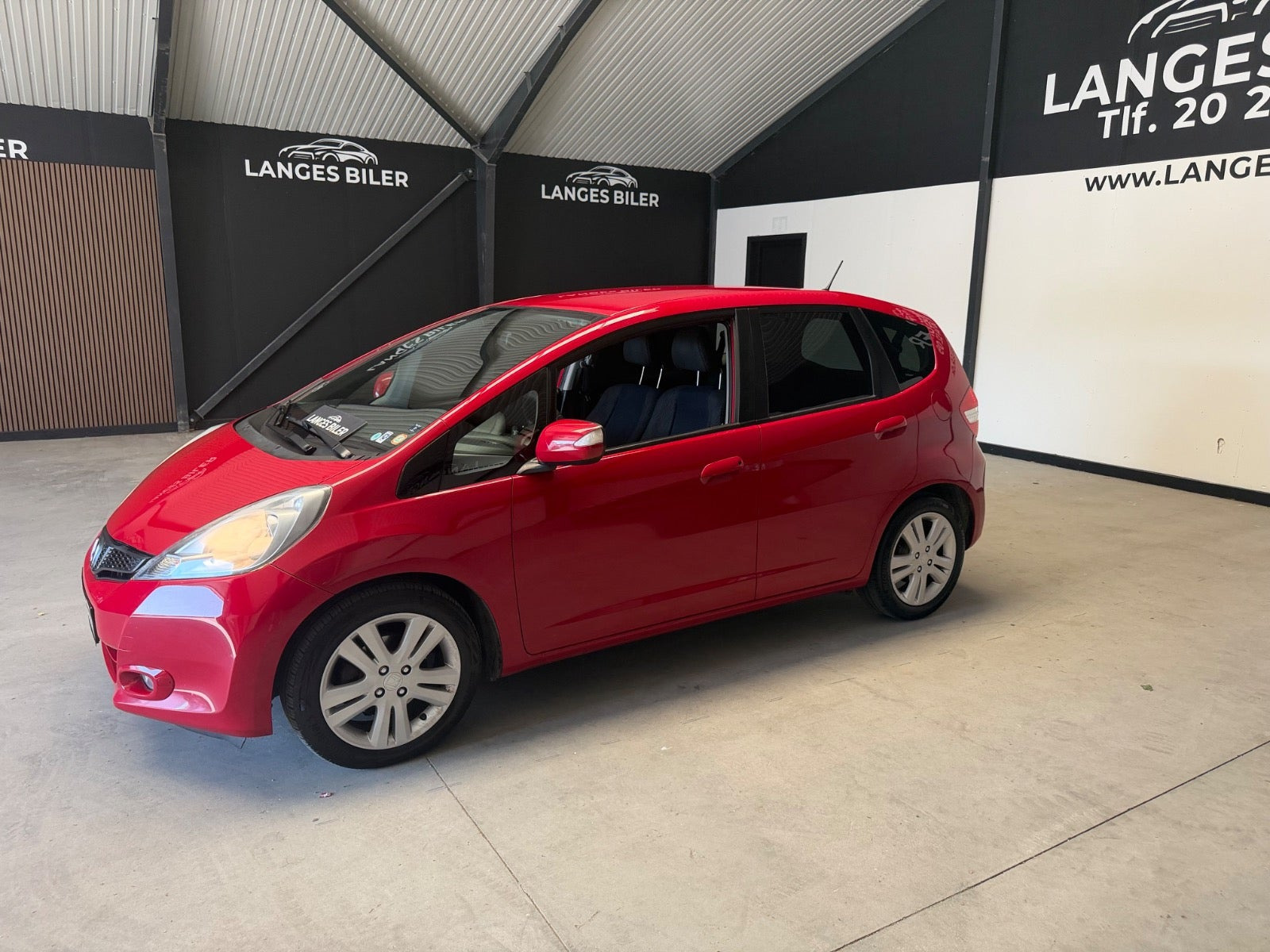 Rød Honda Jazz fra 2014