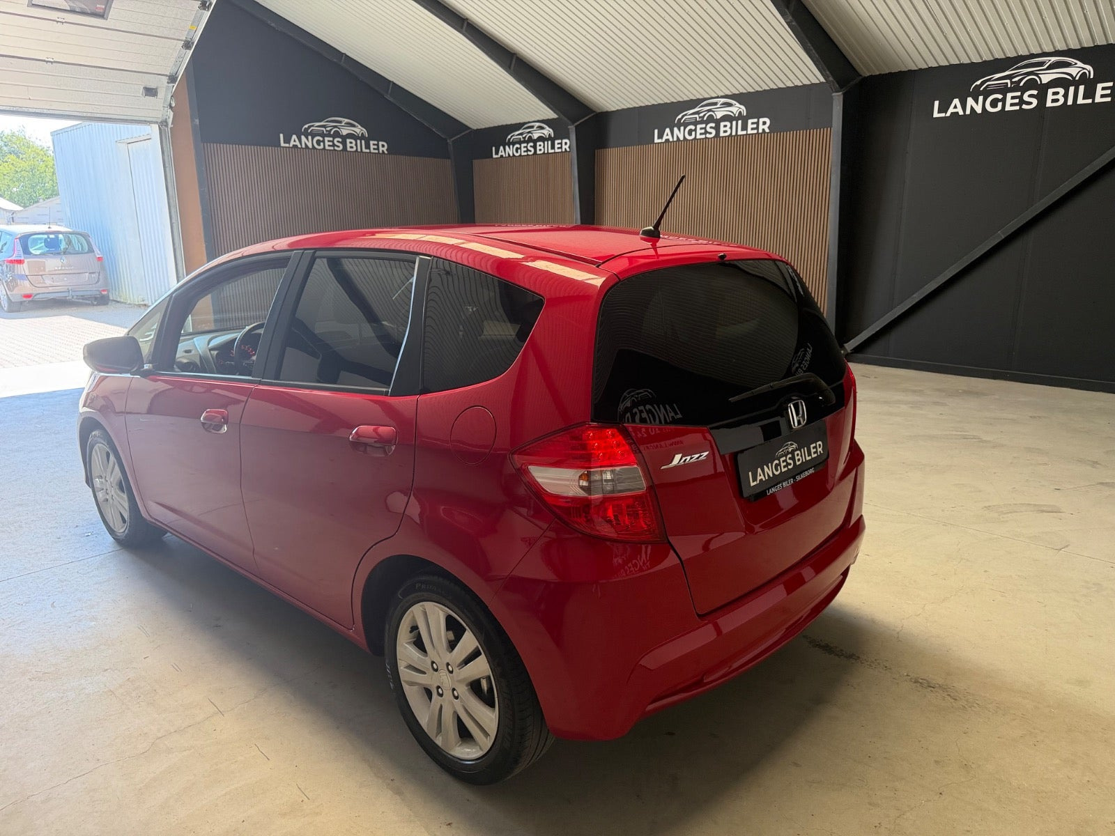 Rød Honda Jazz fra 2014