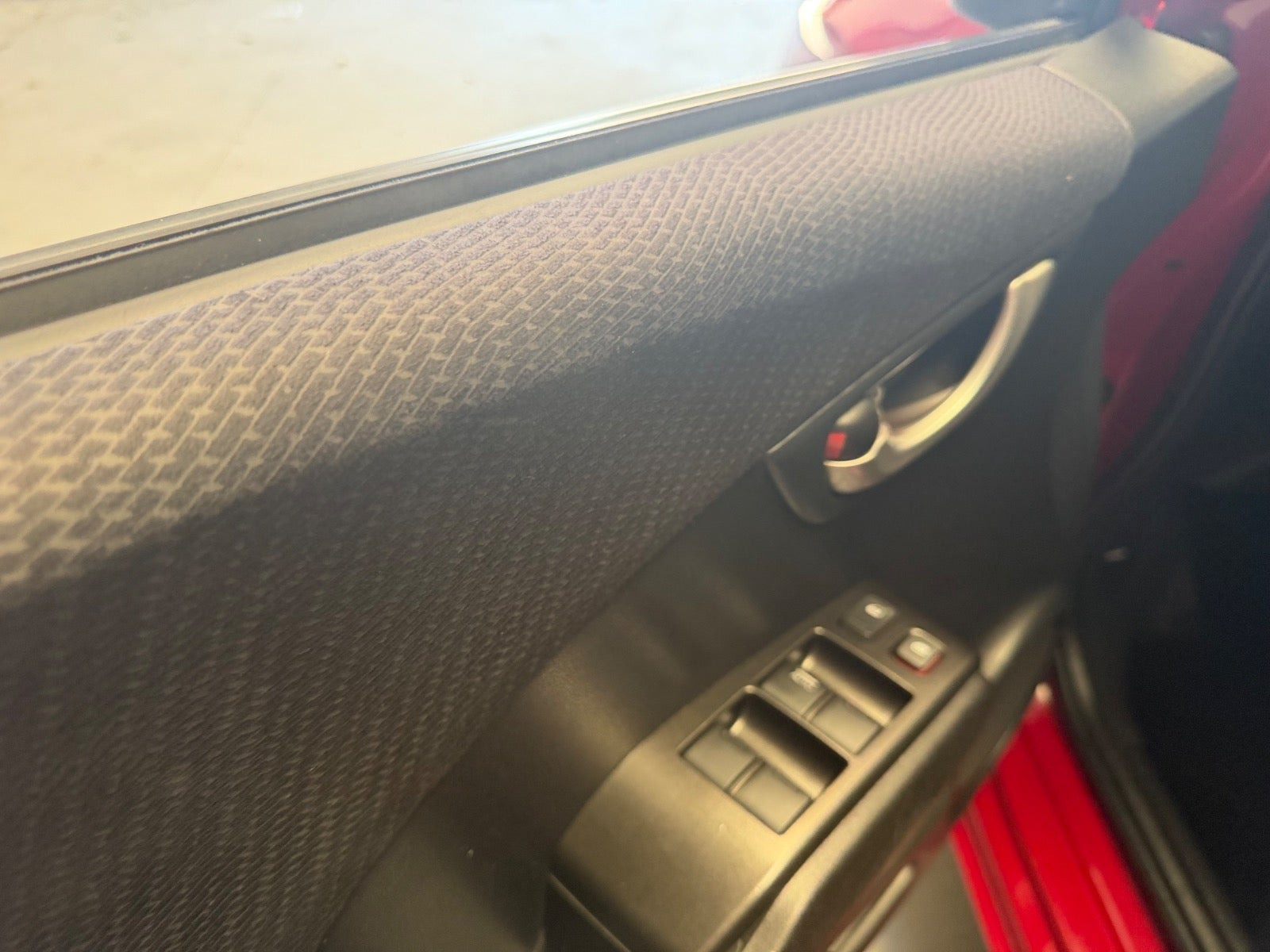 Rød Honda Jazz fra 2014