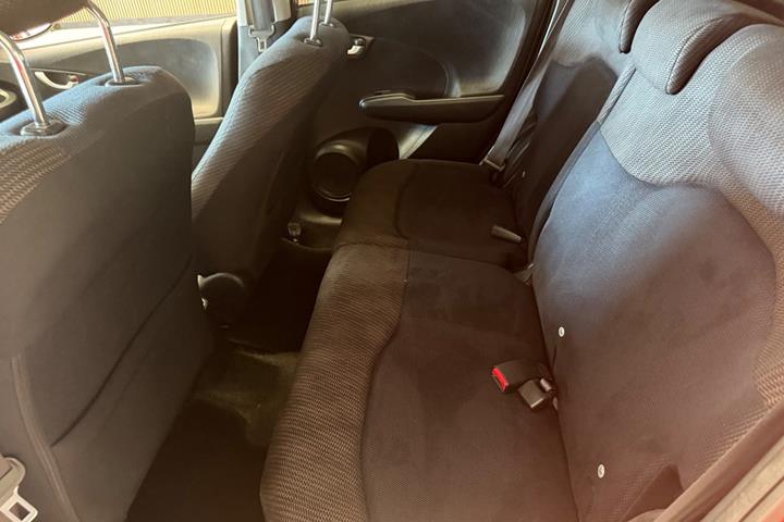 Rød Honda Jazz fra 2014