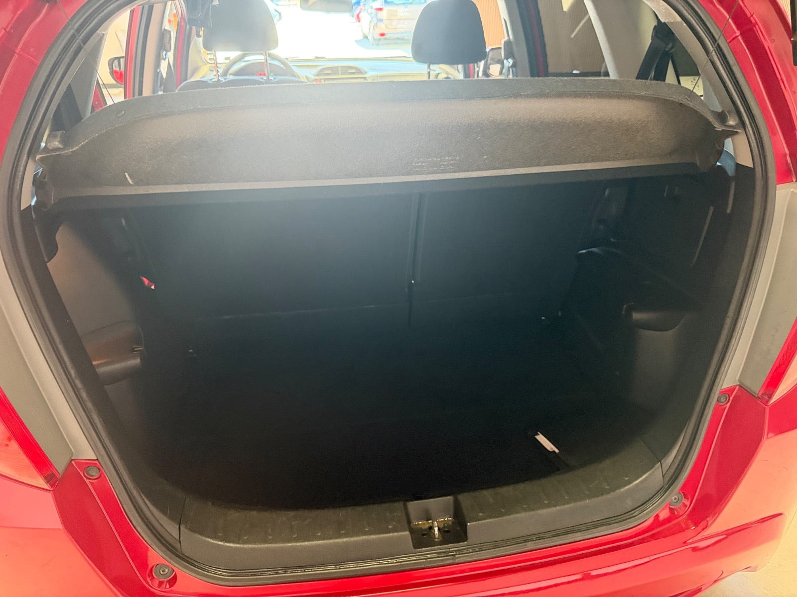 Rød Honda Jazz fra 2014