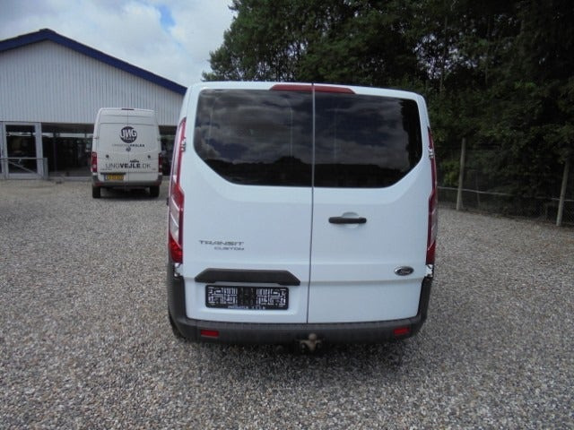 Hvid Ford Transit Custom Kombi 310 L2 fra 2018 set udefra