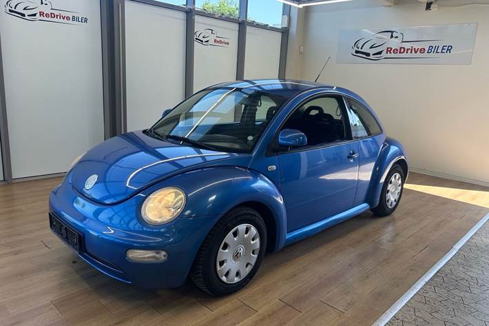 Blå VW Beetle fra 1999