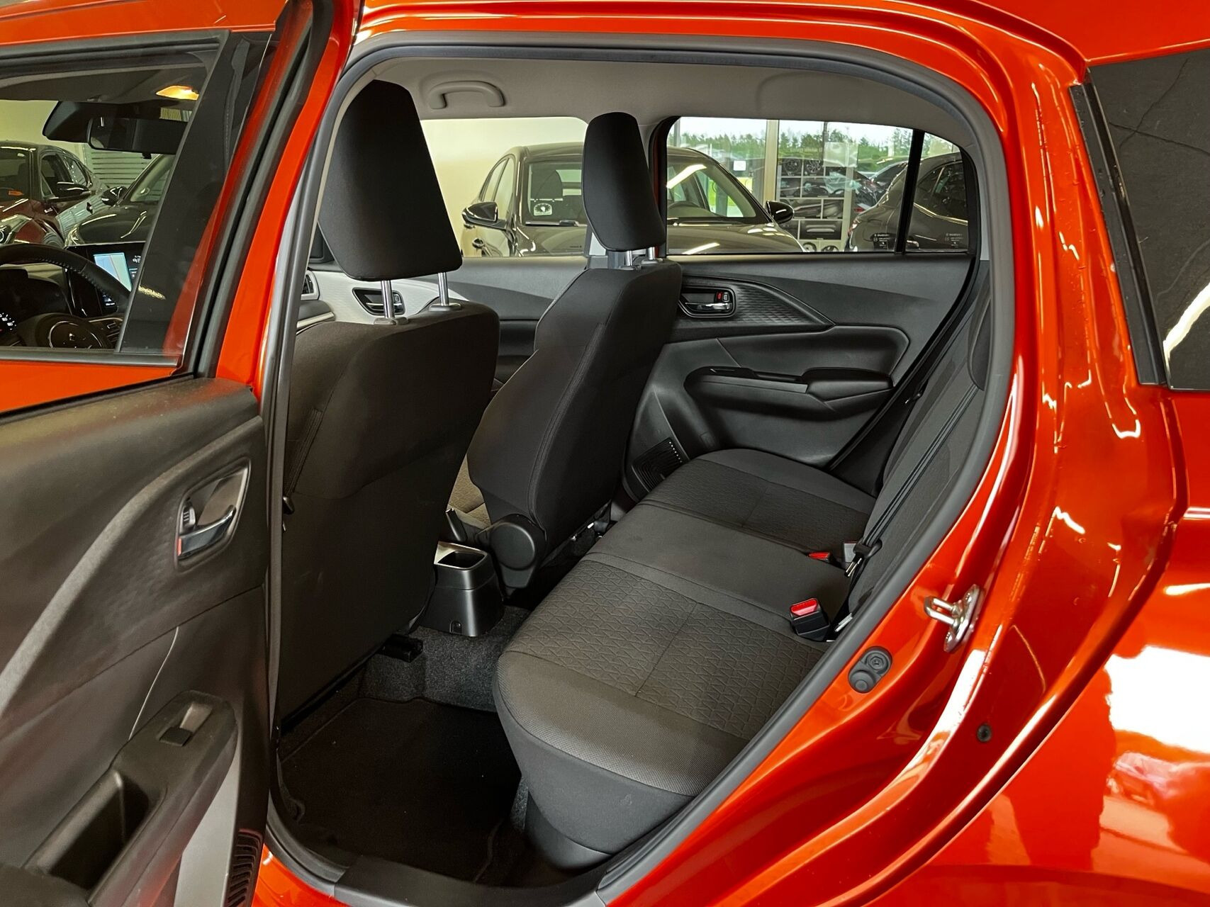 Orange Suzuki Swift fra 2024