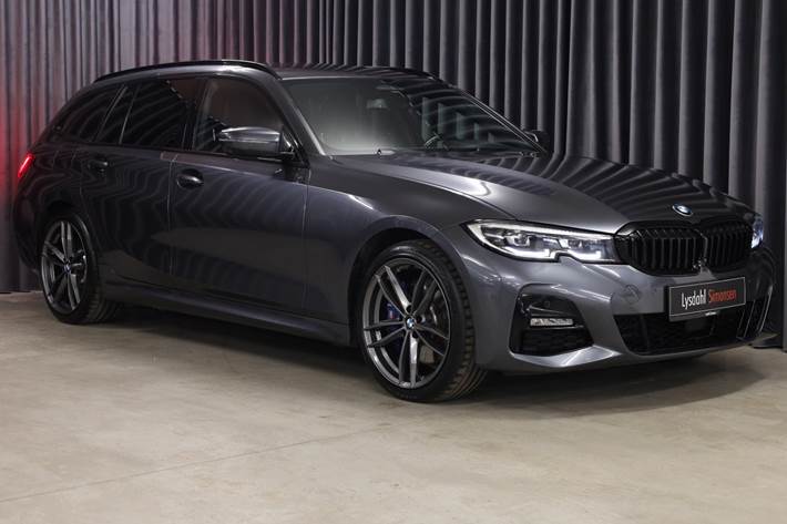 Grå BMW 330e fra 2021