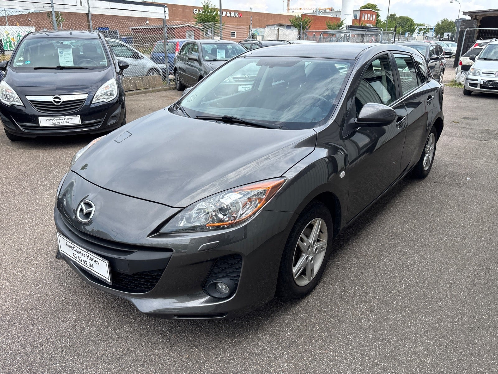 Grå Mazda 3 fra 2012