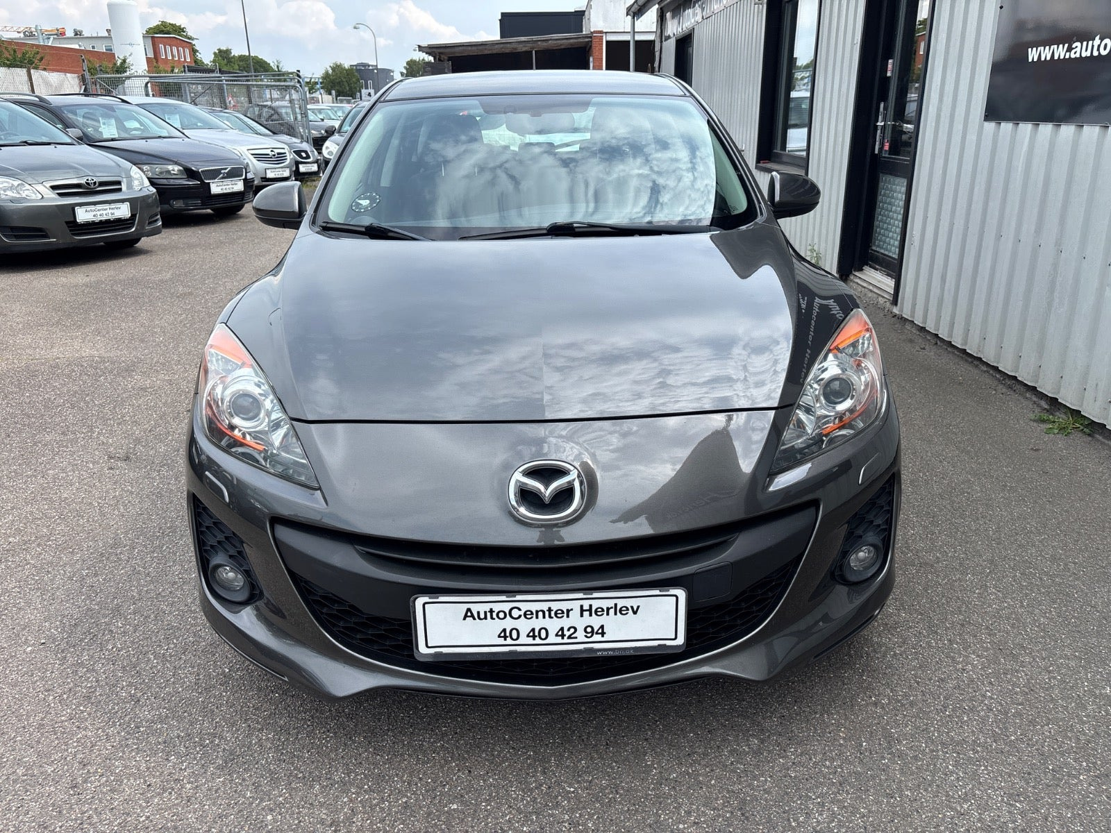 Grå Mazda 3 fra 2012