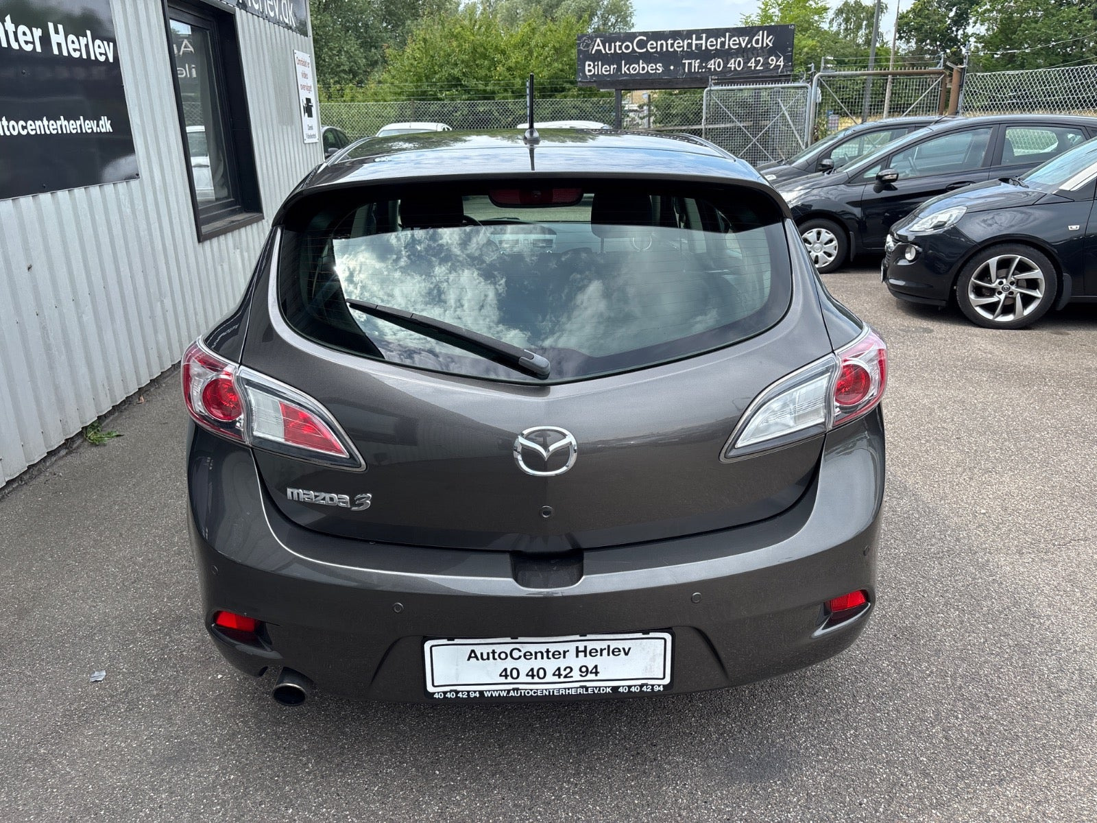Grå Mazda 3 fra 2012