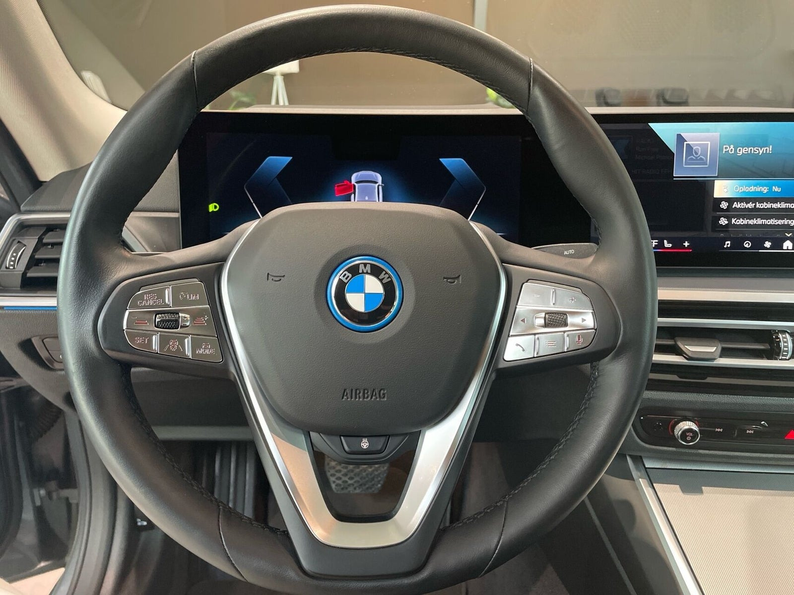 Sølv BMW i4 fra 2024