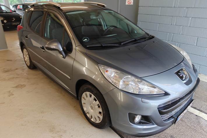 Gul Peugeot 207 fra 2011